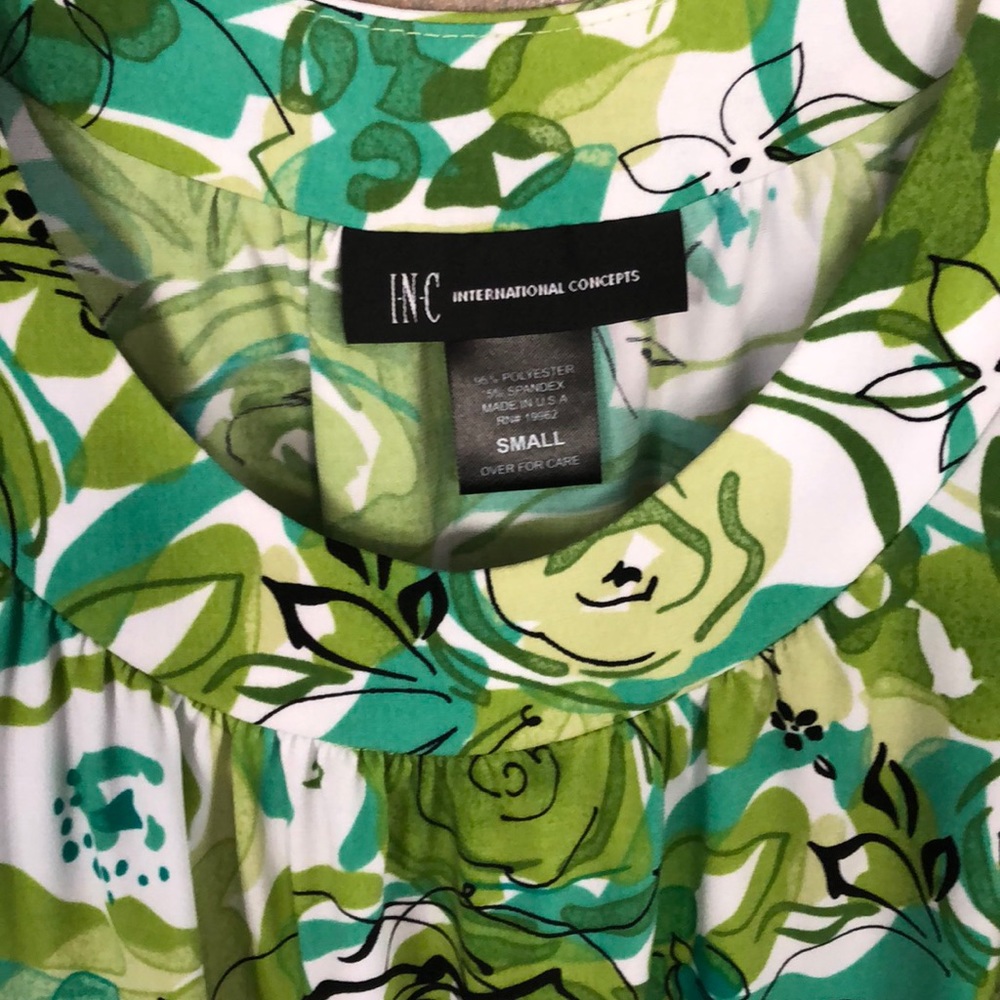Green sleeveless boutique blouse